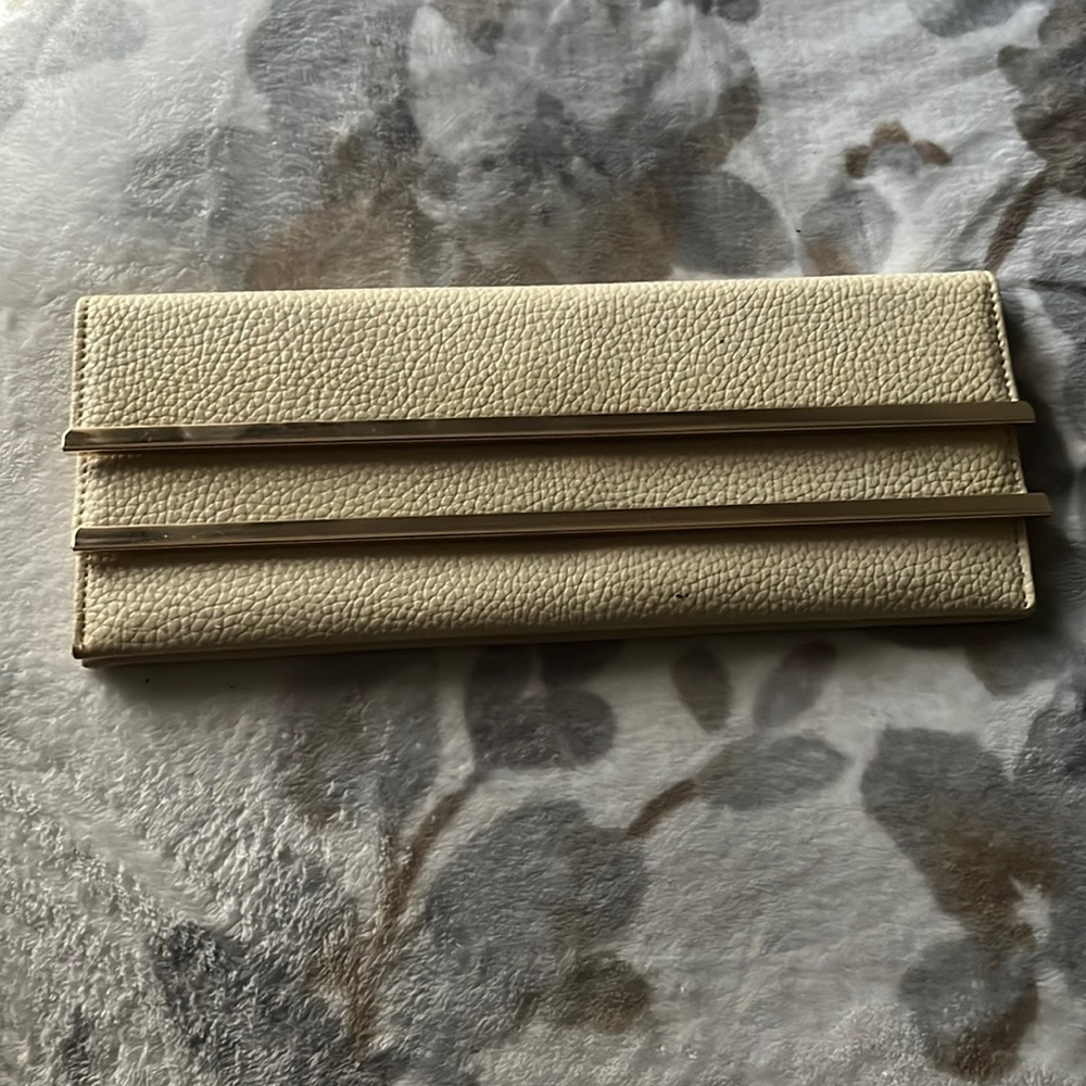 Cream and gold clutch